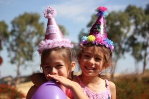 two-girls-together-at-a-party