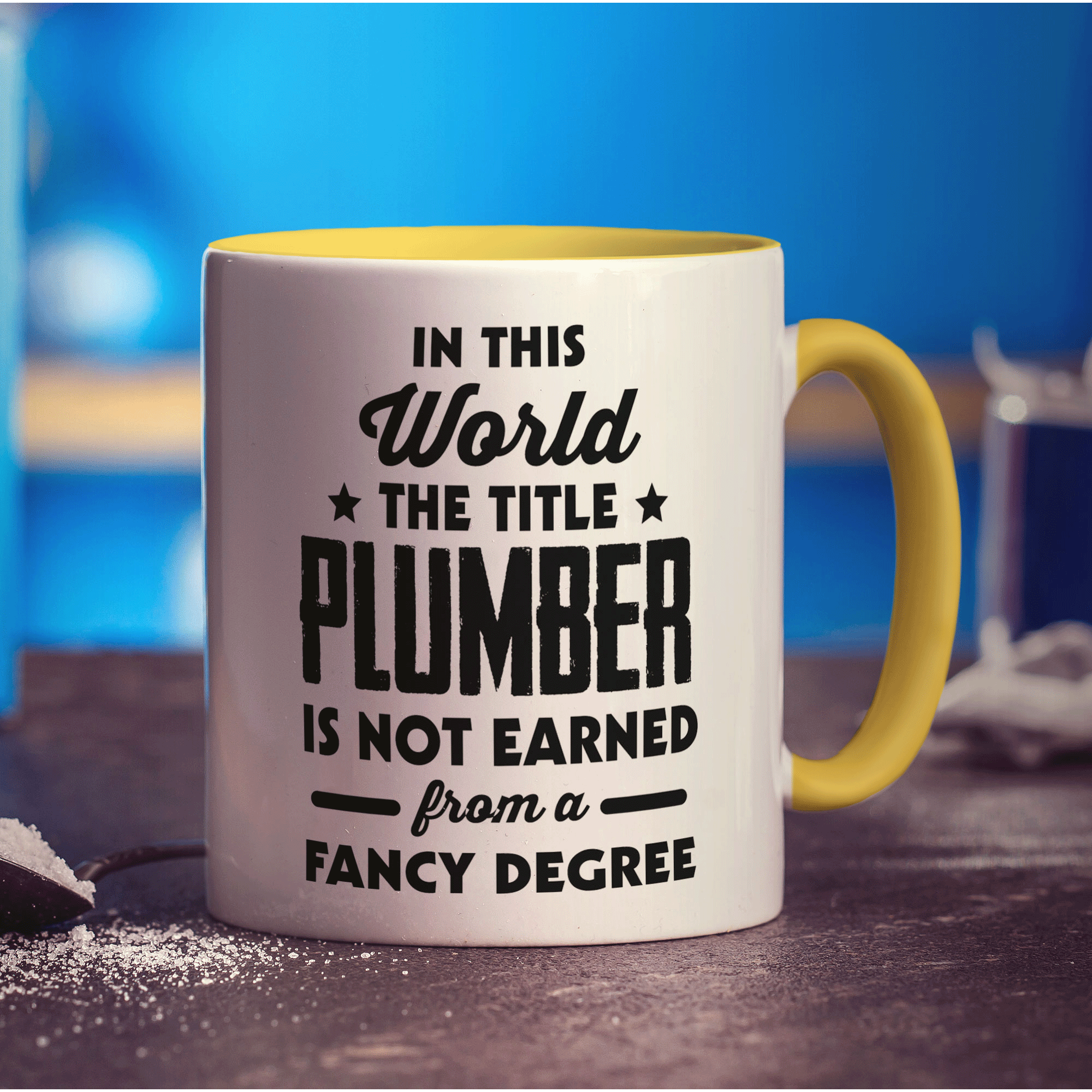 In This World The Title Plumber Is Not Earned From a Fancy Degree Mug - Standard 330ml (11oz) / Yellow