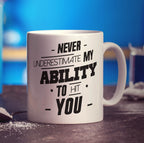 Never Underestimate My Ability To Hit You Mug