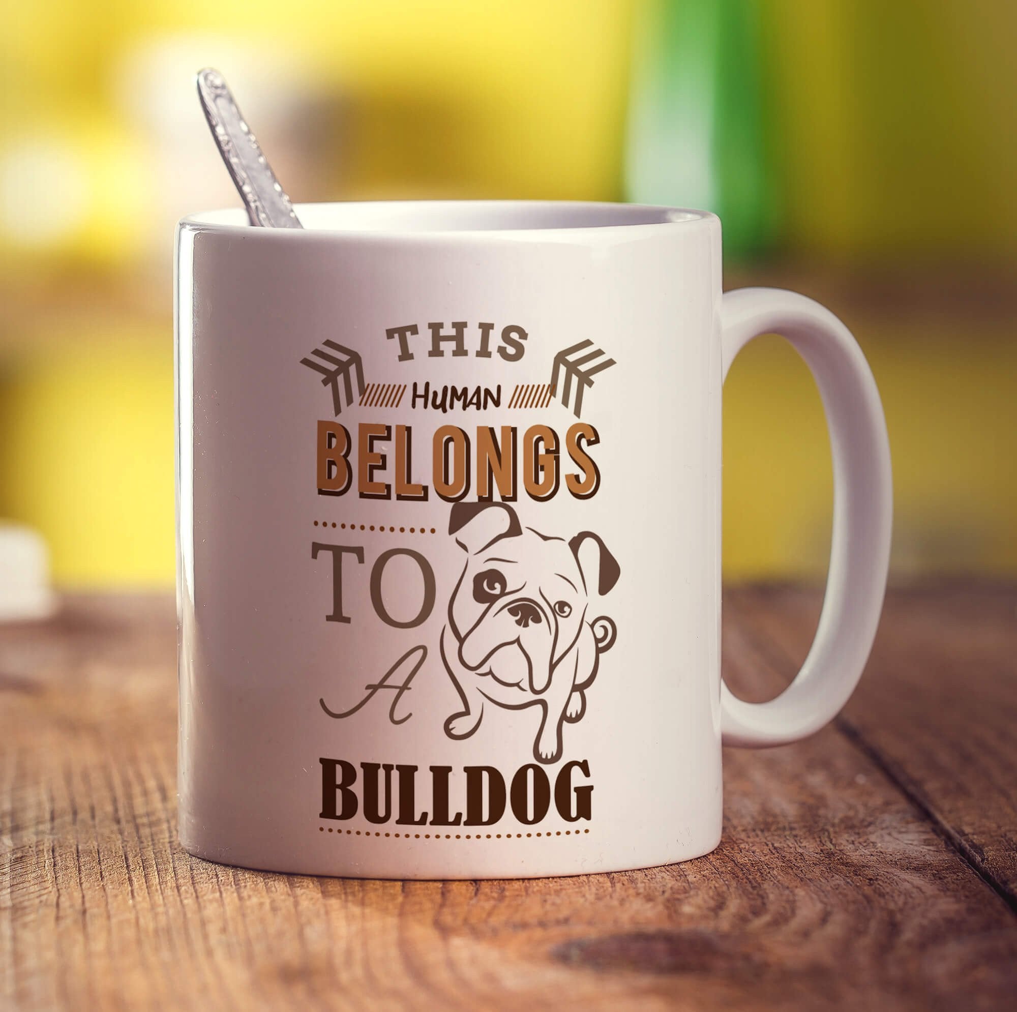 This Human Belongs To A Bulldog Mug