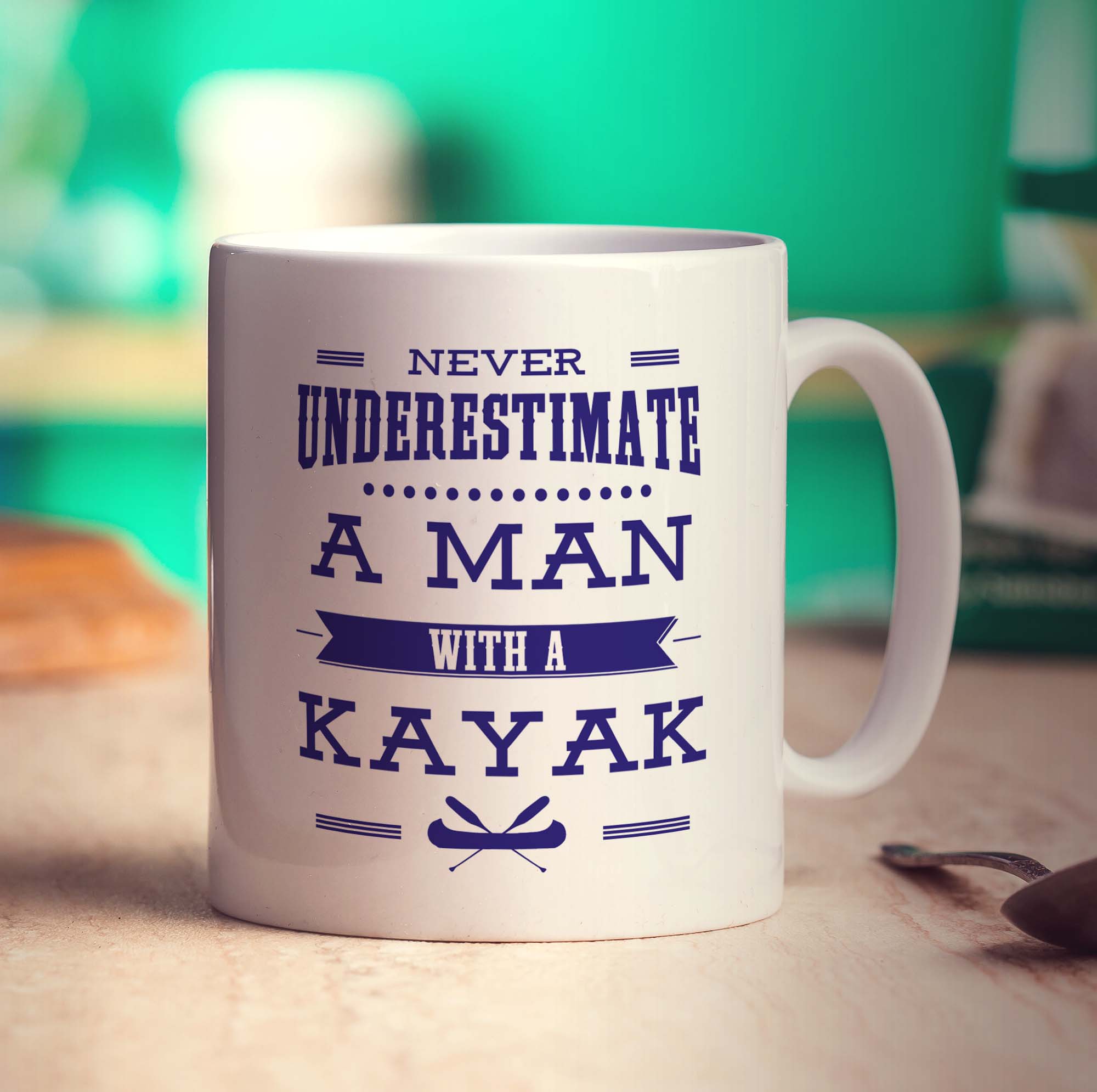 Never Underestimate, A Man With a Kayak Mug