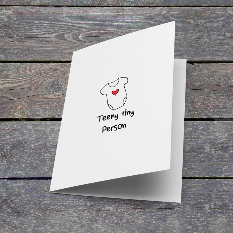 teeny-tiny-person-card-lying-down