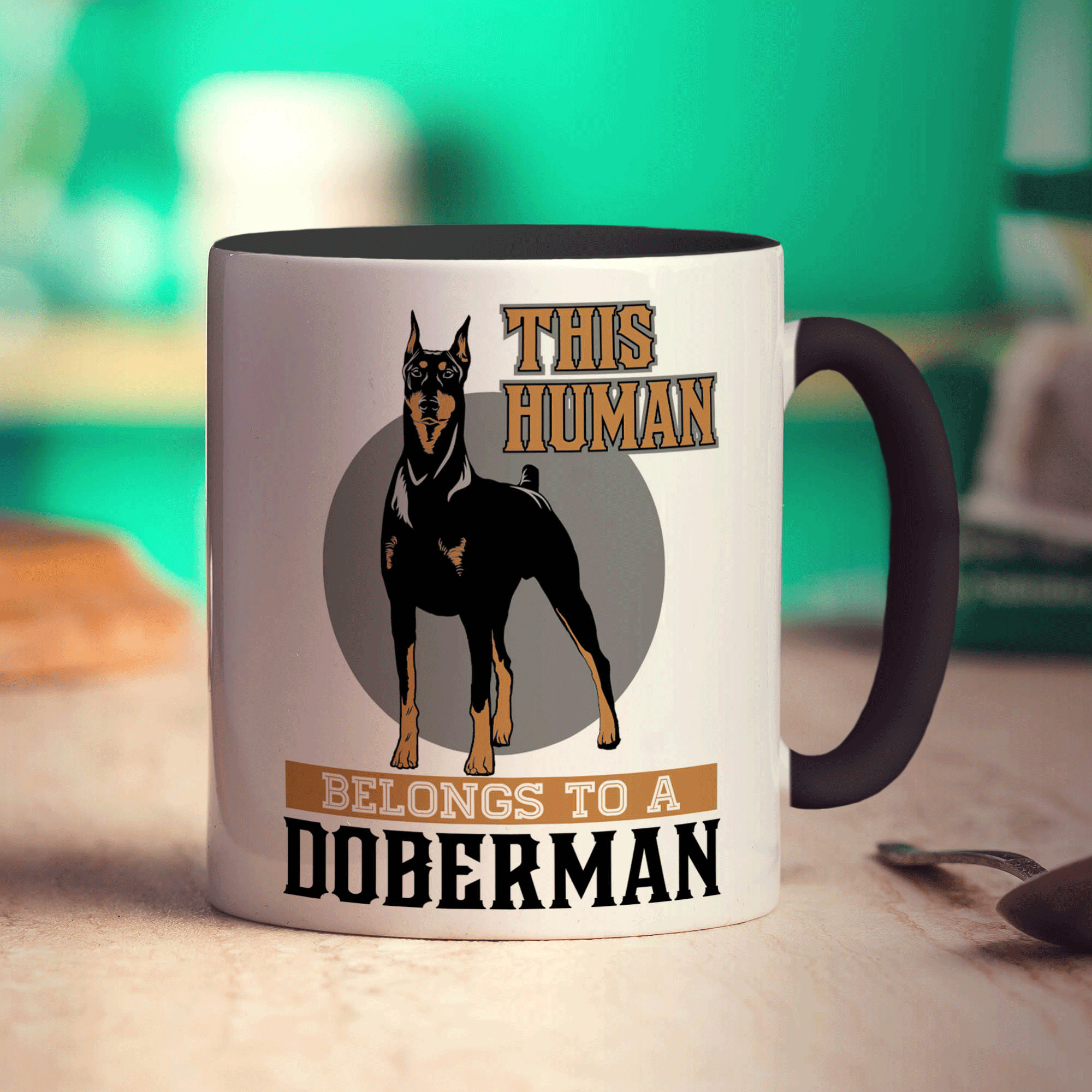 This Human Belongs To A Doberman Mug