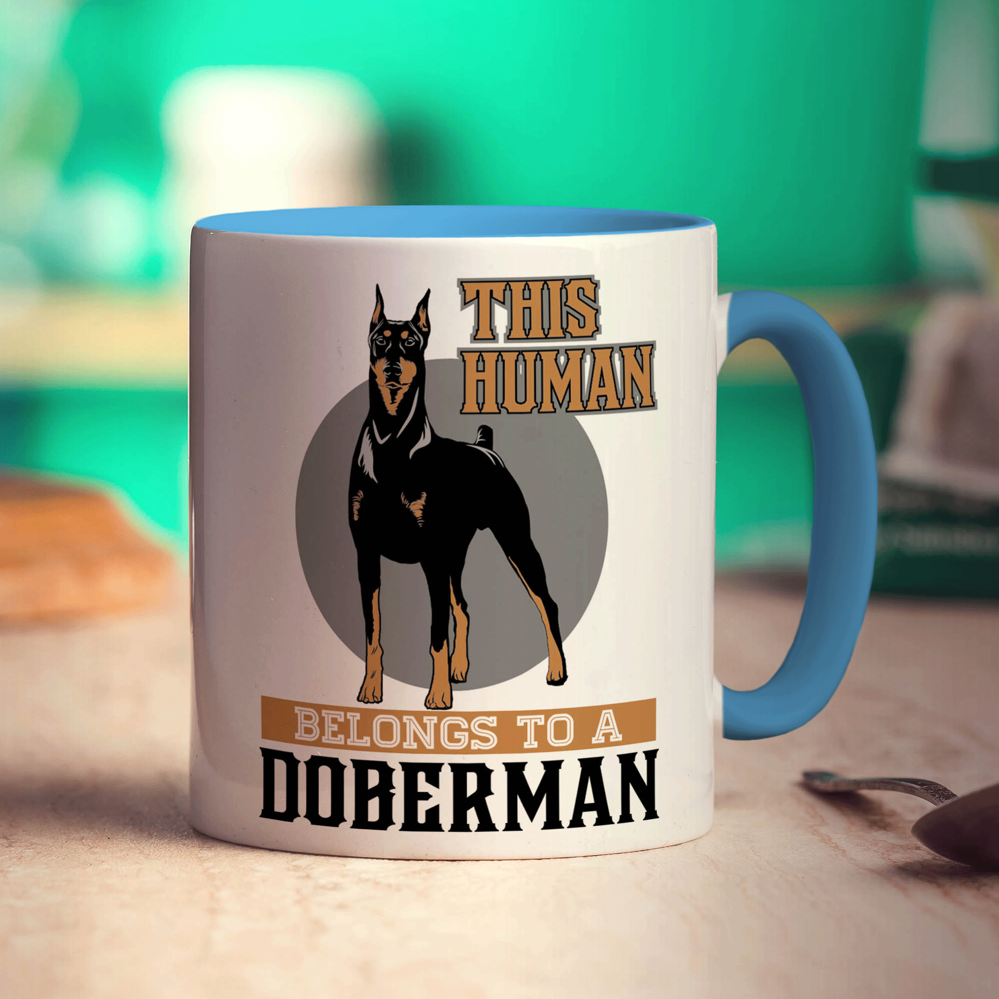 This Human Belongs To A Doberman Mug