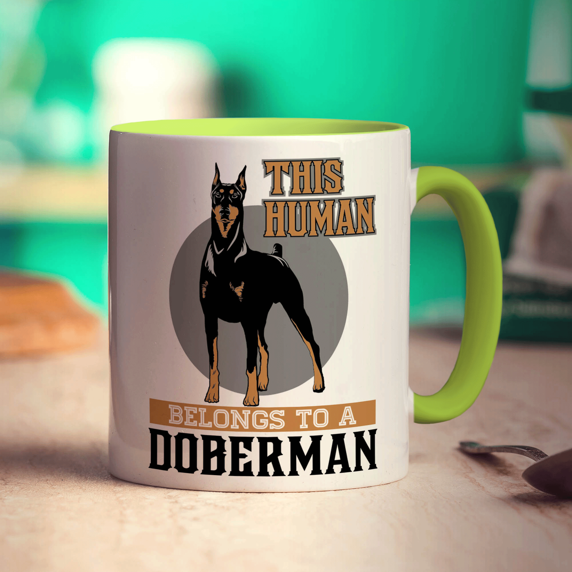 This Human Belongs To A Doberman Mug