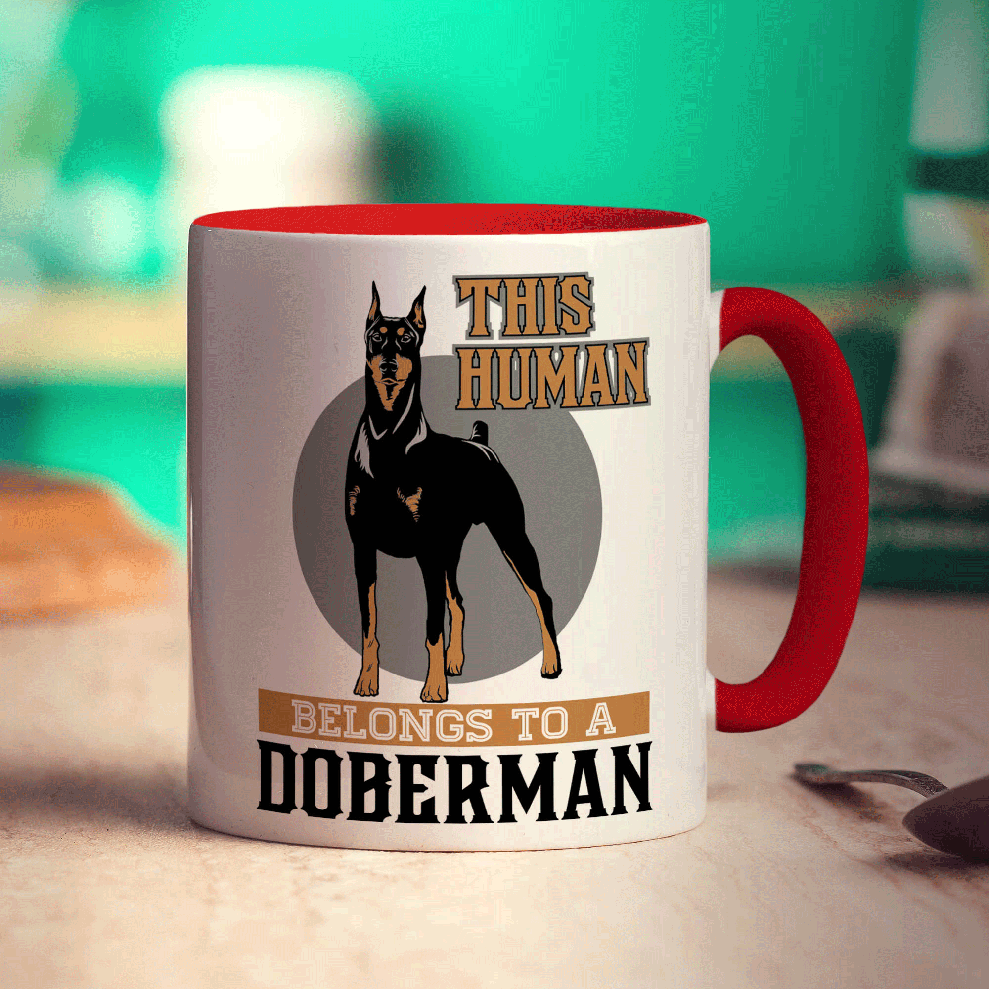 This Human Belongs To A Doberman Mug
