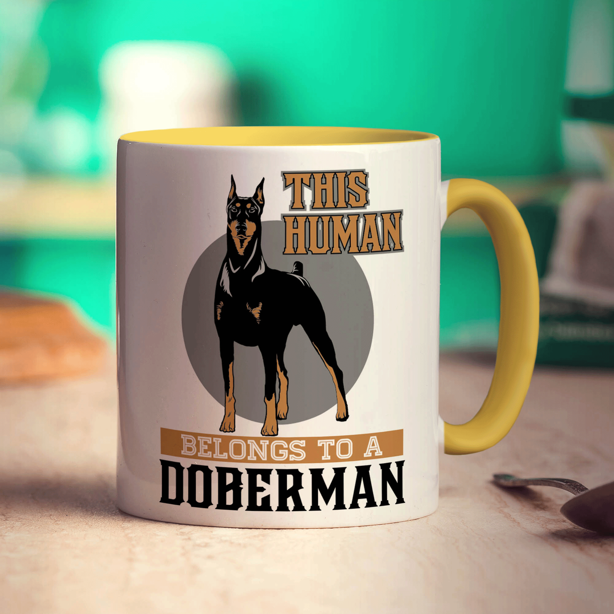 This Human Belongs To A Doberman Mug
