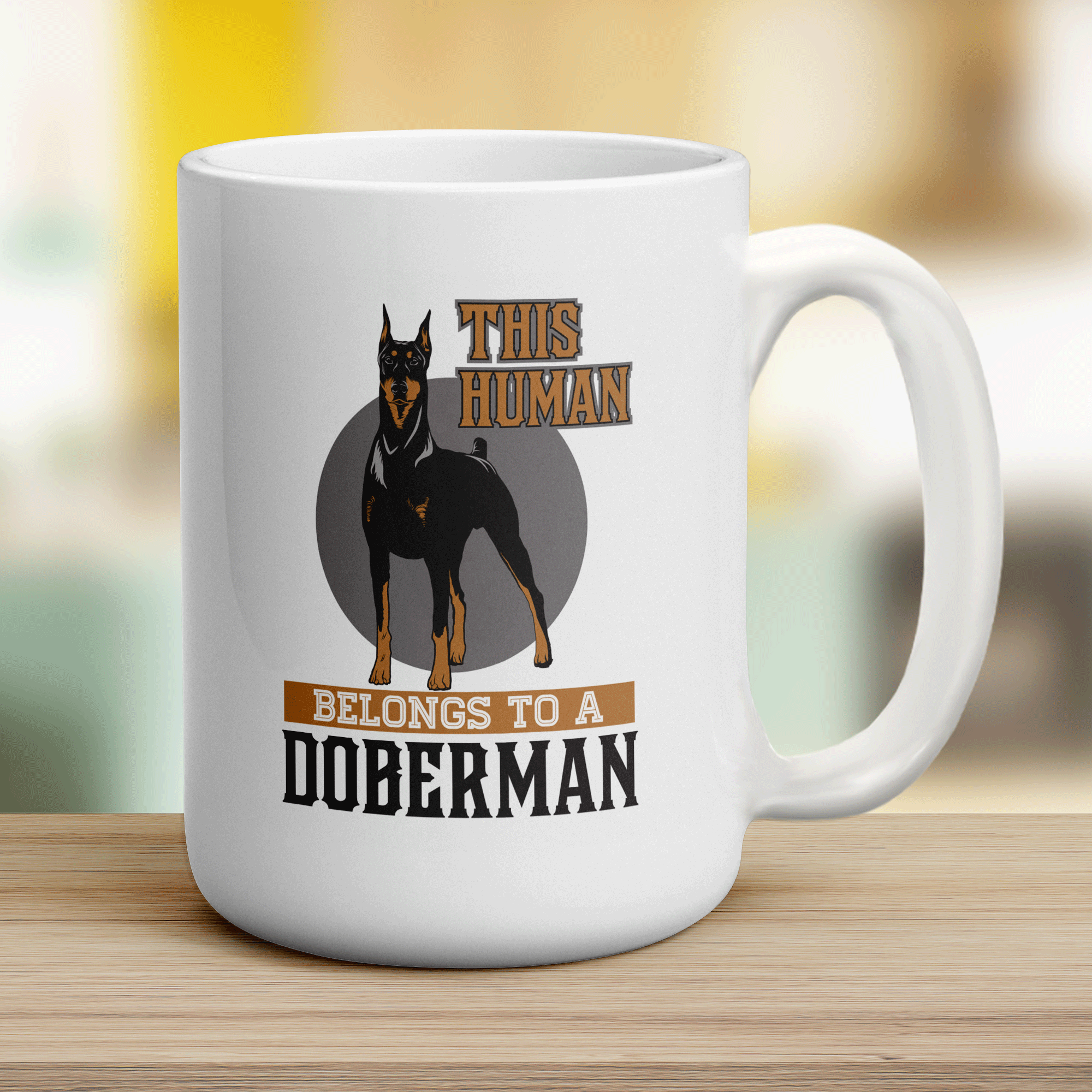 This Human Belongs To A Doberman Mug